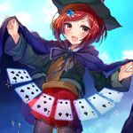  :3 black_cape black_hat black_legwear blush brown_eyes cape card danganronpa hair_ornament hat highres looking_at_viewer new_danganronpa_v3 pantyhose playing_card red_hair red_skirt satoimo_chika short_hair skirt smile solo sweater_vest witch_hat yumeno_himiko 