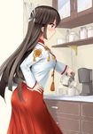  ass black_hair blouse coffee_maker_(object) cowboy_shot cup cupboard drawer dress_shirt hair_ribbon hakama hand_on_hip highres hime_cut hiyou_(kantai_collection) japanese_clothes kantai_collection long_hair minase_(takaoka_nanase) mug profile red_eyes ribbon shirt solo tassel white_ribbon 