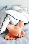  barefoot blanket feet feet_only highres lying matsunaga_kouyou on_bed on_stomach original pov_feet soles solo toes 