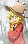  bare_tree blonde_hair blurry blush coat cowboy_shot day depth_of_field floral_print full-face_blush hair_ribbon hands_in_opposite_sleeves hat highres looking_to_the_side moriya_suwako outdoors ribbon scarf scarf_over_mouth short_hair sidelocks snowing solo teoi_(good_chaos) touhou tree unmoving_pattern winter yellow_eyes 