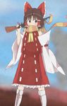  absurdres akabeco benikurage bow brown_eyes brown_hair brown_scarf commentary_request cookie_(touhou) detached_sleeves eyebrows_visible_through_hair gun hair_bow hair_tubes hakurei_reimu highres holding holding_gun holding_weapon looking_at_viewer multicolored multicolored_clothes multicolored_scarf red_bow scarf short_hair solo touhou weapon 