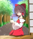  absurdres akabeco blush bow brown_hair closed_mouth cookie_(touhou) detached_sleeves eyebrows_visible_through_hair hair_bow hair_tubes hakurei_reimu highres looking_at_viewer red_bow red_eyes reu short_hair sitting smile solo torii touhou tree 