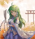  ahoge blue_skirt blush breasts eyebrows_visible_through_hair frog_hair_ornament green_eyes green_hair hair_ornament hair_tubes highres kochiya_sanae large_breasts long_hair looking_at_viewer parted_lips skirt smile solo torii touhou youl 