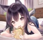  1girl animal_ear_fluff animal_ears artist_name bed black_hair blurry brown_eyes dated depth_of_field eating fluno food hair_between_eyes highres holding holding_food indoors long_hair looking_at_viewer lying on_bed on_stomach original sandwich solo tail 