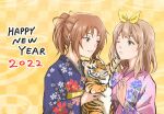  2022 2girls animal blonde_hair blue_kimono brown_hair closed_mouth commentary_request curryisfriend floral_print green_eyes hair_ribbon hands_up happy_new_year hibike!_euphonium highres holding holding_animal japanese_clothes kimono long_hair long_sleeves looking_at_another medium_hair multiple_girls nakagawa_natsuki new_year one_eye_closed parted_lips pink_kimono ponytail purple_eyes ribbon smile tiger yellow_ribbon yoshikawa_yuuko 