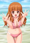  beach bikini breast_squeeze breasts brown_eyes brown_hair cleavage day double_v girls_und_panzer highres large_breasts leaning_forward long_hair looking_at_viewer open_mouth pink_bikini smile solo standing swimsuit t_k takebe_saori v 