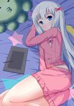  absurdres bangs blanket blue_eyes bow closed_mouth commentary_request crescent drawing_tablet eromanga_sensei eyebrows_visible_through_hair frilled_shirt frilled_shorts frills from_above hair_bow highres izumi_sagiri long_hair looking_at_viewer looking_up lying on_bed on_side pajamas pink_bow pink_pajamas pink_shirt pink_shorts shirt shorts silver_hair solo star star_print stuffed_animal stuffed_octopus stuffed_toy stylus tablet tareme very_long_hair wavy_mouth xiaosamiao 