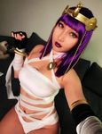  1girl bandage breasts cosplay dark_skin female menat menat_(cosplay) naked_bandage navel rinnie_riot street_fighter street_fighter_v 