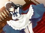  apron bangs black_hair blue_dress blunt_bangs blush breasts closed_mouth commentary_request dress dutch_angle eyebrows_visible_through_hair frilled_apron frills highres indoors large_breasts light_rays long_hair maid maid_headdress original sidelocks smile solo stairs standing sunbeam sunlight tareme thighhighs tougetsu_hajime wavy_hair white_legwear 