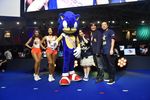 3girls asian breasts cleavage collaboration furry highres hooters looking_at_viewer multiple_girls sega short_hair skirt smile sonic sonic_forces sonic_the_hedgehog 
