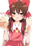  apron ascot bangs blush bow bowl brown_eyes brown_hair chestnut commentary_request detached_sleeves eyebrows_visible_through_hair food food_on_face hair_between_eyes hair_bow hair_tubes hakurei_reimu highres holding holding_bowl karasusou_nano looking_at_viewer open_mouth pink_apron red_bow ribbon-trimmed_sleeves ribbon_trim rice rice_on_face sidelocks simple_background solo touhou upper_body white_background wide_sleeves 