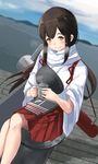  akagi_(kantai_collection) blush brown_eyes brown_hair cloud cloudy_sky commentary crossed_legs cup day holding holding_cup hot_drink kantai_collection long_hair looking_at_viewer outdoors scarf sidelocks sitting sky smile solo steam untsue water 