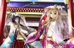  architecture blonde_hair blue_hair east_asian_architecture hat highres japanese_clothes kimono long_hair looking_at_viewer love_live! love_live!_sunshine!! matsuura_kanan multiple_girls ohara_mari orein outstretched_hand pipe purple_eyes smile yellow_eyes 