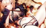  apple artoria_pendragon_(all) atha_(leejuiping) bangs black_bra black_panties blonde_hair blush bra breasts cloak closed_mouth commentary_request criss-cross_halter fate/grand_order fate_(series) food fruit grapes halterneck heart heart_print highres lingerie looking_at_viewer lying medium_breasts navel on_back panties partial_commentary saber_alter sidelocks solo thighs underwear yellow_eyes 