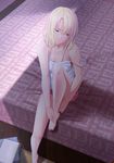  bare_legs bare_shoulders barefoot bed bed_sheet blonde_hair blue_eyes book breasts cleavage collarbone commentary_request dress highres indoors knee_up looking_away medium_breasts on_bed original short_hair shuko_hime sitting solo tawagoto_dukai_no_deshi white_dress 