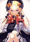  abigail_williams_(fate/grand_order) artist_name bangs beret blonde_hair blue_eyes bow commentary dress fate/grand_order fate_(series) frilled_dress frilled_sleeves frills fujikiri_yana gradient gradient_background hair_bow hat holding holding_stuffed_animal knees_together_feet_apart lolita_fashion long_hair long_sleeves looking_at_viewer orange_bow parted_bangs polka_dot polka_dot_bow sitting sleeves_past_wrists solo stuffed_animal stuffed_toy teddy_bear too_many_bows 