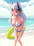  arms_behind_back bangs bare_shoulders beach bikini blue_bikini breasts cleavage cloud cloudy_sky collarbone colored_eyelashes day eyebrows_visible_through_hair fate/grand_order fate_(series) feet_out_of_frame frilled_bikini frills green_innertube highres horizon horns innertube kafkasea kiyohime_(fate/grand_order) kiyohime_(swimsuit_lancer)_(fate) knees_together_feet_apart leaning_forward long_hair medium_breasts navel outdoors red_eyes shore silver_hair sky solo stomach swimsuit thigh_gap very_long_hair 