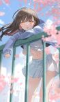  1girl :o against_railing blue_hoodie blue_skirt blue_sky blurry blurry_foreground blush brown_hair cherry_blossoms commentary cowlick day falling_petals feet_out_of_frame floating_hair highres hood hood_down hoodie legs_apart long_bangs looking_at_viewer midriff midriff_peek miniskirt mole mole_under_eye navel nima_(niru54) open_mouth orange_eyes original outdoors petals pleated_skirt railing sidelocks signature skirt sky sleeves_past_wrists solo stomach thighs wind wind_lift 
