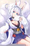  animal_ears azur_lane bangs blue_eyes blue_skirt blunt_bangs blush bob_cut breasts brown_background cleavage eyebrows_visible_through_hair fox_ears fox_tail head_tilt highres holding_tail invisible_chair japanese_clothes kaga_(azur_lane) kimono kon_(k0n16) kyuubi large_breasts long_sleeves looking_at_viewer multiple_tails obi parted_lips ribbon_trim sash short_hair silver_hair simple_background sitting skirt smile solo tail tassel white_kimono wide_sleeves 