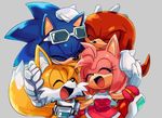  1girl 3boys amy_rose eyes_closed eyewear_on_head friends goggles goggles_around_neck group_hug hand_on_another&#039;s_head happy hug knuckles_the_echidna laughing lowres multiple_boys open_mouth smile sonic sonic_riders sonic_the_hedgehog sunglasses tails_(sonic) 