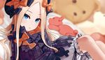  abigail_williams_(fate/grand_order) bangs black_bow black_dress black_hat blonde_hair bloomers blue_eyes blurry blurry_background bow bug butterfly commentary_request depth_of_field dress fate/grand_order fate_(series) forehead hair_bow hat insect long_hair long_sleeves looking_at_viewer omaru_gyuunyuu orange_bow parted_bangs parted_lips polka_dot polka_dot_bow sitting sleeves_past_wrists solo stuffed_animal stuffed_toy teddy_bear underwear white_bloomers 