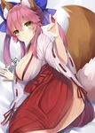  animal_ears ass bad_id bad_pixiv_id blush bow breasts cleavage commentary_request fate/extra fate/extra_ccc fate/grand_order fate_(series) fox_ears fox_shadow_puppet fox_tail hair_bow hair_ribbon hakama hakama_skirt japanese_clothes large_breasts looking_back lying miko nontraditional_miko pink_hair red_hakama ribbon ribbon_trim solo tail tamamo_(fate)_(all) tamamo_no_mae_(fate) wide_sleeves yellow_eyes yuzu-aki 