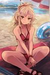  absurdres beach beach_towel beach_umbrella bikini blonde_hair blue_innertube bracelet collarbone day fate/grand_order fate_(series) front-tie_bikini front-tie_top green_eyes hair_ornament hair_scrunchie highres indian_style innertube jewelry looking_at_viewer mitu-yuki mordred_(fate)_(all) mordred_(swimsuit_rider)_(fate) mountain ponytail red_bikini red_scrunchie scrunchie side-tie_bikini sitting smile solo swimsuit towel umbrella v_arms water 