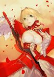  absurdres aestus_estus ahoge blonde_hair breasts cleavage dress fate/extra fate_(series) green_eyes hair_between_eyes hair_ribbon head_tilt highres holding holding_sword holding_weapon jam_(nandade) large_breasts nero_claudius_(fate) nero_claudius_(fate)_(all) parted_lips petals red_ribbon ribbon short_hair solo strapless strapless_dress sword weapon 