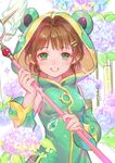  animal_costume antenna_hair balabling blush brown_hair cardcaptor_sakura frog frog_costume green_eyes highres hood kinomoto_sakura looking_at_viewer magical_girl short_hair smile solo wand yume_no_tsue 