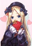  abigail_williams_(fate/grand_order) absurdres bangs black_bow black_dress black_hat blonde_hair blue_eyes bow commentary_request covered_mouth dress fate/grand_order fate_(series) gift hair_bow hat head_tilt heart highres holding holding_gift long_hair long_sleeves looking_at_viewer orange_bow parted_bangs sleeves_past_fingers sleeves_past_wrists solo striped striped_background valentine vertical-striped_background vertical_stripes very_long_hair yuuki_nao_(pixiv10696483) 