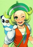  :&lt; animal animal_on_shoulder bag bel_(pokemon) beret blonde_hair blush breasts collarbone commentary_request dress flipped_hair gen_5_pokemon green_background green_eyes green_hat handbag happy hat kuro_kemuri looking_at_viewer on_shoulder one_eye_closed oshawott otter pokemon pokemon_(creature) pokemon_(game) pokemon_bw pokemon_on_shoulder short_hair simple_background size_difference small_breasts smile tongue upper_body upper_teeth vest 