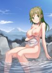  :3 arm_under_breasts breast_hold breasts collarbone convenient_leg day eyebrows_visible_through_hair green_eyes green_hair head_tilt highres holding holding_towel inuyama_aoi large_breasts long_hair looking_at_viewer mountain nipples nude onsen outdoors rock saiste sitting smile soaking_feet solo thick_eyebrows thighs towel white_towel yurucamp 