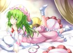  aka_tawashi bed blush bow bowtie commentary_request crescent_print curtains dress eyebrows_visible_through_hair frills green_eyes green_hair hat highres kazami_yuuka kazami_yuuka_(pc-98) leg_up long_hair long_sleeves looking_at_viewer lying nightcap nightgown no_shoes on_stomach one_eye_closed pillow pink_dress pocket_watch red_bow red_neckwear smile socks solo star star_print touhou touhou_(pc-98) watch white_legwear 