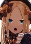  abigail_williams_(fate/grand_order) artist_name bangs black_bow black_dress black_hat blonde_hair blue_eyes bow commentary_request dress dyolf fate/grand_order fate_(series) forehead hair_bow hat head_tilt long_hair long_sleeves open_mouth oral_invitation orange_bow parted_bangs polka_dot polka_dot_bow simple_background sleeves_past_fingers sleeves_past_wrists solo tongue tongue_out translation_request white_background 