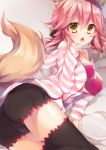  absurdres animal_ears ass black_legwear blush bra breasts fang fate/grand_order fate_(series) fox_ears fox_tail highres kinosaki_yuuta large_breasts looking_at_viewer lying off_shoulder open_clothes open_mouth open_shirt pink_bra pink_hair shirt solo striped striped_shirt tail tamamo_(fate)_(all) tamamo_no_mae_(fate) thighhighs underwear yellow_eyes 
