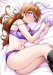  1girl ass bare_arms bare_shoulders bed_sheet black_socks blush bra breasts brown_hair closed_mouth commentary_request feet_out_of_frame groin hair_between_eyes hair_ornament hair_spread_out hairclip highres kneehighs konoe_kanata legs_together long_hair looking_at_viewer love_live! love_live!_nijigasaki_high_school_idol_club lying medium_breasts navel on_side panties pillow pillow_grab purple_bra purple_eyes purple_panties smile socks solo stomach strap_slip striped_pillow underwear underwear_only wavy_hair yopparai_oni 