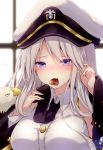 animal azur_lane badge bald_eagle bangs bird black_coat black_neckwear blurry blurry_background blush breasts buttons chocolate chocolate_heart collared_shirt eagle enterprise_(azur_lane) eyebrows_visible_through_hair hat heart holding kabocha_usagi large_breasts long_hair long_sleeves looking_at_viewer military military_hat military_uniform mouth_hold necktie nose_blush off_shoulder purple_eyes shirt sidelocks signature silver_hair sleeveless sleeveless_shirt solo uniform upper_body valentine white_shirt window wing_collar 