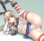  1girl anchor_hair_ornament anus arm_support black_panties blonde_hair bosshi crop_top elbow_gloves gloves grey_background grin hair_ornament hand_on_own_head highres kantai_collection long_hair lying miniskirt on_side panties partially_visible_anus shimakaze_(kantai_collection) simple_background skirt smile solo striped striped_legwear thighhighs thong underwear v white_gloves 