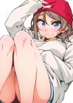  ayumu-k beanie blue_eyes grey_hair hand_on_headwear hat highres knees_up long_sleeves looking_at_viewer love_live! love_live!_sunshine!! red_hat shirt short_hair short_shorts shorts simple_background sleeves_past_wrists smile solo sweatshirt watanabe_you white_background white_shirt 