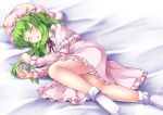  aka_tawashi ass black_neckwear black_ribbon blush closed_eyes commentary_request crescent_print dress eyebrows_visible_through_hair feet_out_of_frame frilled_dress frills green_hair hat highres kazami_yuuka kazami_yuuka_(pc-98) long_hair long_sleeves lying neck_ribbon nightcap nightgown no_shoes on_side parted_lips pink_dress ribbon sleeping socks solo touhou touhou_(pc-98) white_legwear 