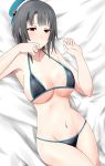  bed_sheet beret bikini black_bikini black_hair blue_hat blush breasts collarbone covering_mouth cowboy_shot crossed_legs gudon_(iukhzl) hand_over_own_mouth hat kantai_collection large_breasts looking_at_viewer lying navel on_back on_bed red_eyes ribs short_hair sideboob solo swimsuit takao_(kantai_collection) 