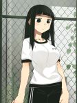  bangs bernard-jou_iwaku. black_eyes black_hair black_shorts blunt_bangs chain-link_fence closed_mouth cowboy_shot double_vertical_stripe fence gym_uniform highres ivy jpeg_artifacts kanbayashi_shiori light_frown long_hair looking_at_viewer plant shirt short_sleeves shorts solo standing t-shirt tsunosame weeds white_shirt 