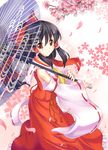  black_hair bow cherry_blossoms detached_sleeves hair_bow hakurei_reimu highres long_hair miyuki_rei oriental_umbrella red_eyes smile solo touhou umbrella 