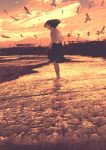  animal bird black_skirt brown_hair evening floating_hair flock from_side gemi highres lamppost medium_hair ocean orange_sky original scenery seagull sepia shore skirt skirt_hold sky solo standing wading 