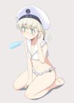  anchor androgynous bikini blue_eyes blush clothes_writing collarbone commentary eyebrows_visible_through_hair food full_body grey_background hat kantai_collection kugui_kiyunemu microskirt military military_uniform navel pleated_skirt popsicle sailor_bikini sailor_collar sailor_hat seiza sexually_suggestive short_hair silver_hair sitting skirt solo swimsuit uniform white_hat z1_leberecht_maass_(kantai_collection) 