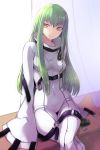  breasts c.c. code_geass crossed_legs green_hair highres long_hair looking_at_viewer sakuma_tsukasa sitting sleeves_past_wrists smile solo straitjacket yellow_eyes 