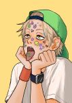  1boy backwards_hat baseball_cap blonde_hair chainsaw_man commentary_request denji_(chainsaw_man) hat head_rest heureoreo korean_commentary male_focus orange_eyes sharp_teeth shirt smartwatch solo sticker_on_face t-shirt teeth tongue tongue_out upper_body watch wristband wristwatch yellow_background 