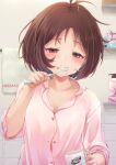  1girl ahoge arigato_(rmskrtkdlqj) breasts brown_eyes brown_hair brushing_teeth cleavage clenched_teeth collarbone cup dot_nose hidaka_ai highres holding holding_cup holding_toothbrush idolmaster idolmaster_dearly_stars indoors long_sleeves messy_hair mug pajamas partially_unbuttoned pink_pajamas shampoo_bottle short_hair sleepy small_breasts solo teeth toothbrush toothbrush_in_mouth towel towel_rack upper_body 