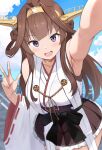  1girl ahoge arm_up armpits bare_shoulders blush breasts brown_hair day detached_sleeves double_bun hair_bun hair_ornament hairband headgear highres japanese_clothes kantai_collection kongou_(kancolle) kongou_kai_ni_(kancolle) large_breasts long_hair looking_at_viewer nagare_(flow) nontraditional_miko open_mouth outdoors skirt smile solo thighhighs v 