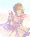  1girl antenna_hair blue_sky blush brown_hair cardcaptor_sakura dress flower fuuin_no_tsue gloves green_eyes hair_flower hair_ornament highres holding holding_wand im_your_g9 kinomoto_sakura magical_girl outdoors short_hair sky smile solo sunlight wand white_gloves 